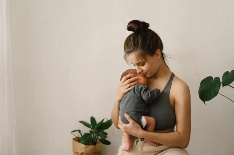 Mother-embracing-the-baby